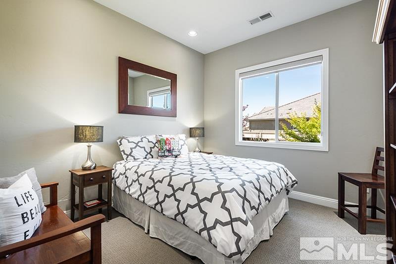 10055 Gold Cup Lane Reno, NV 89521 - Photo 17 of 25 a bedroom with a bed and window