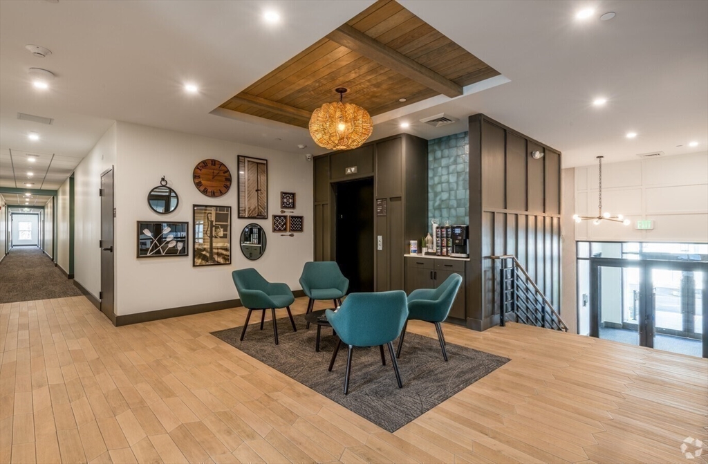 635 Main Street, Unit TH6 Wilmington, MA 01887 - Photo 17 of 29 a living room with furniture and a large window