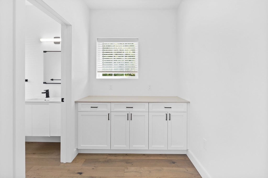635 Main Street, Unit TH6 Wilmington, MA 01887 - Photo 6 of 29 a view of cabinets and window in a room