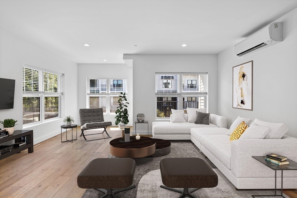 635 Main Street, Unit TH6 Wilmington, MA 01887 - Photo 7 of 29 a living room with furniture and a large window