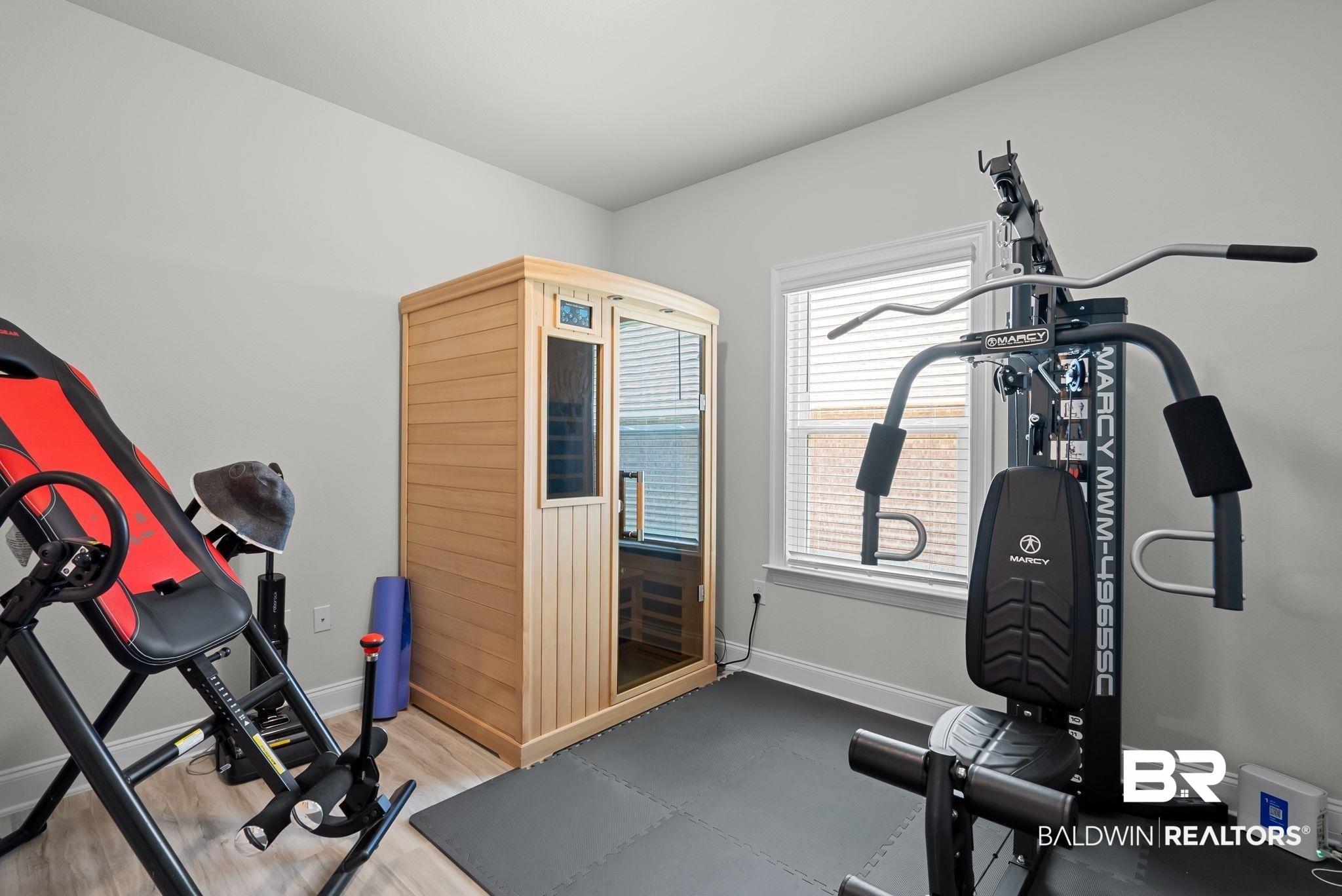 13966 Antler Hl Road Daphne, AL 36527 - Photo 25 of 44 Dedicated fitness room featuring light wood-finish flooring, a window with blinds, and white baseboards