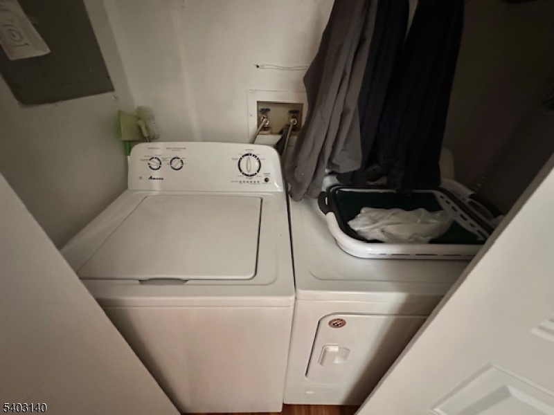 211 Sunshine Court Sayreville, NJ 08859 - Photo 14 of 15 a utility room with dryer and washer