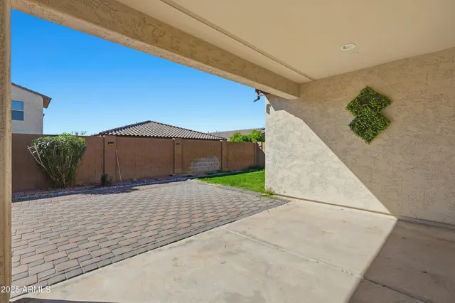 a backyard of a house with lots of green space