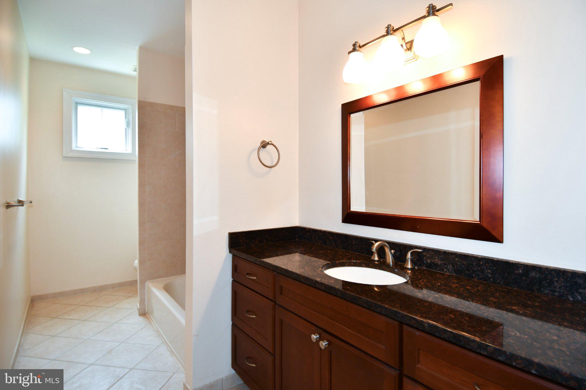 1924 Leonard Road Falls Church, VA 22043 - Photo 39 of 61 Elegant bathroom with modern finishes.