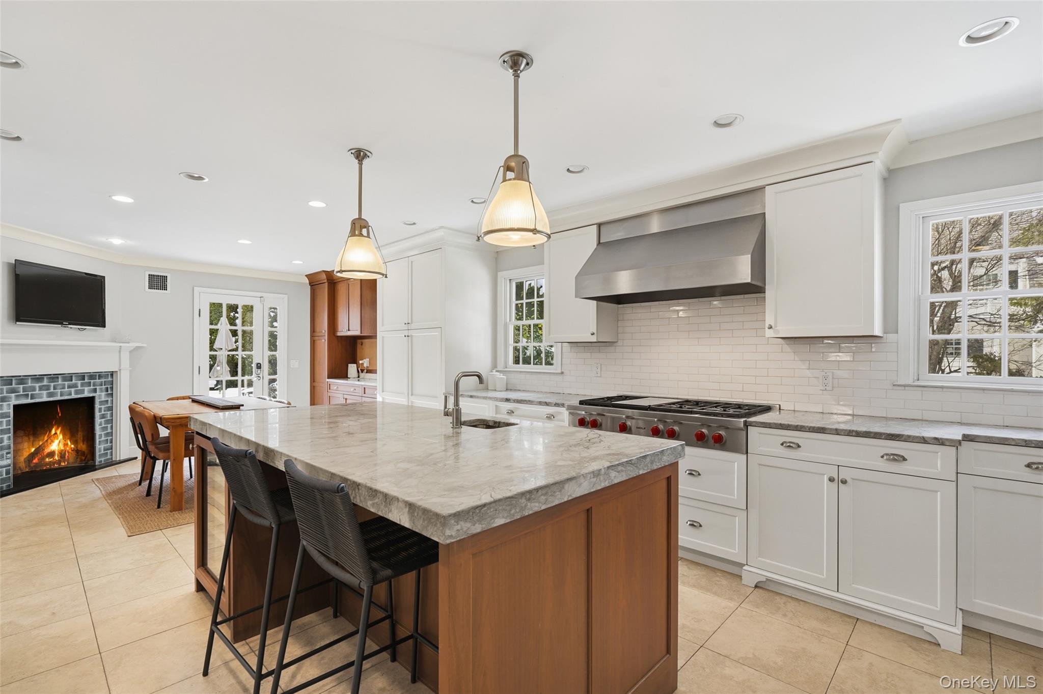 51 Paddington Road Scarsdale, NY 10583 - Photo 5 of 43 Stunning Eat-in Kitchen with walnut island with bar seating and sink