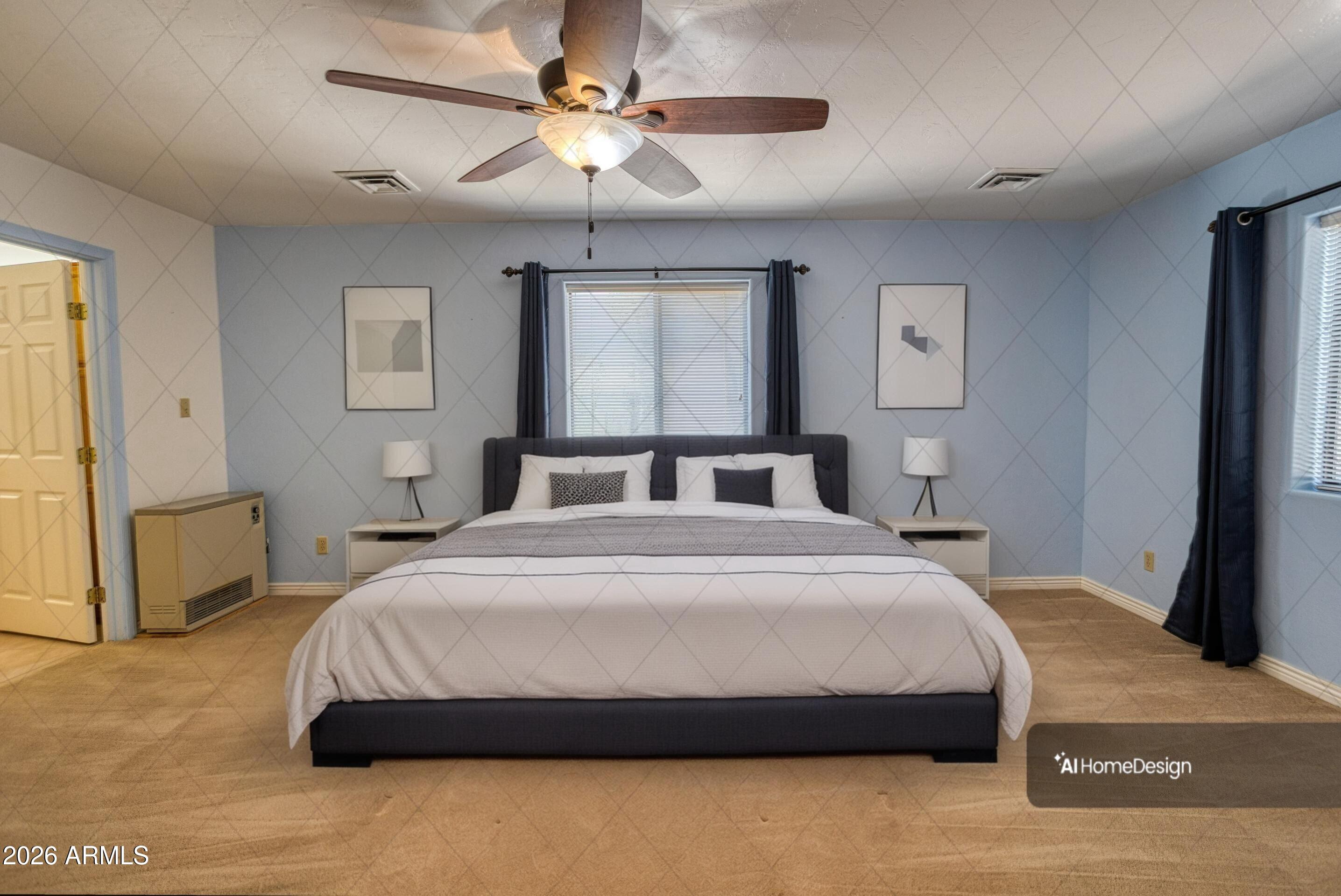 949 Geronimo Lane Show Low, AZ 85901 - Photo 15 of 43 a bedroom with a large bed and a chandelier