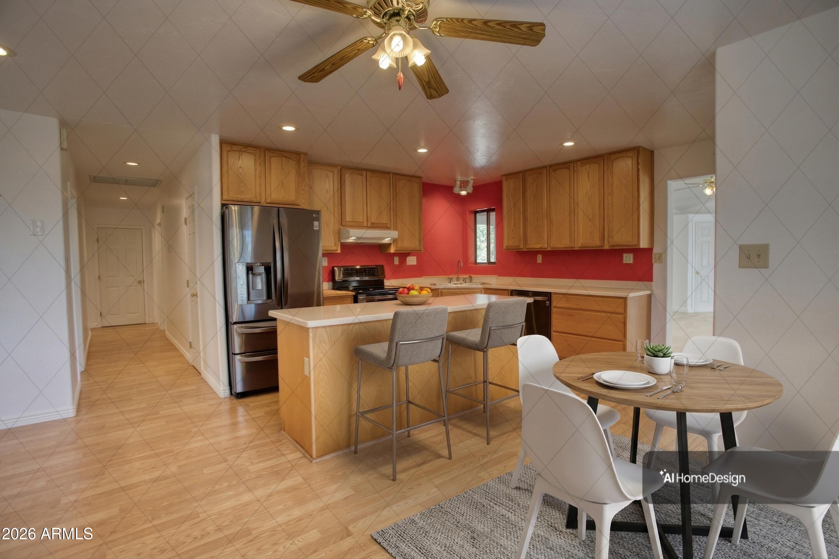 949 Geronimo Lane Show Low, AZ 85901 - Photo 10 of 43 a kitchen with refrigerator and cabinets