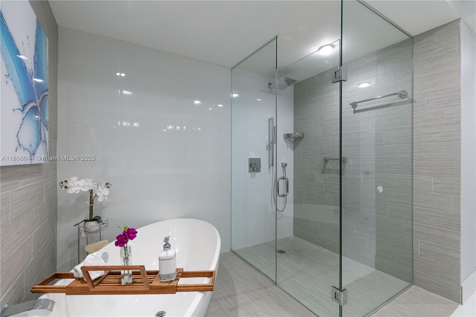 330 Sunny Isles Boulevard, Unit 51103 Sunny Isles Beach, FL 33160 - Photo 20 of 34 a bathroom with a shower and a sink