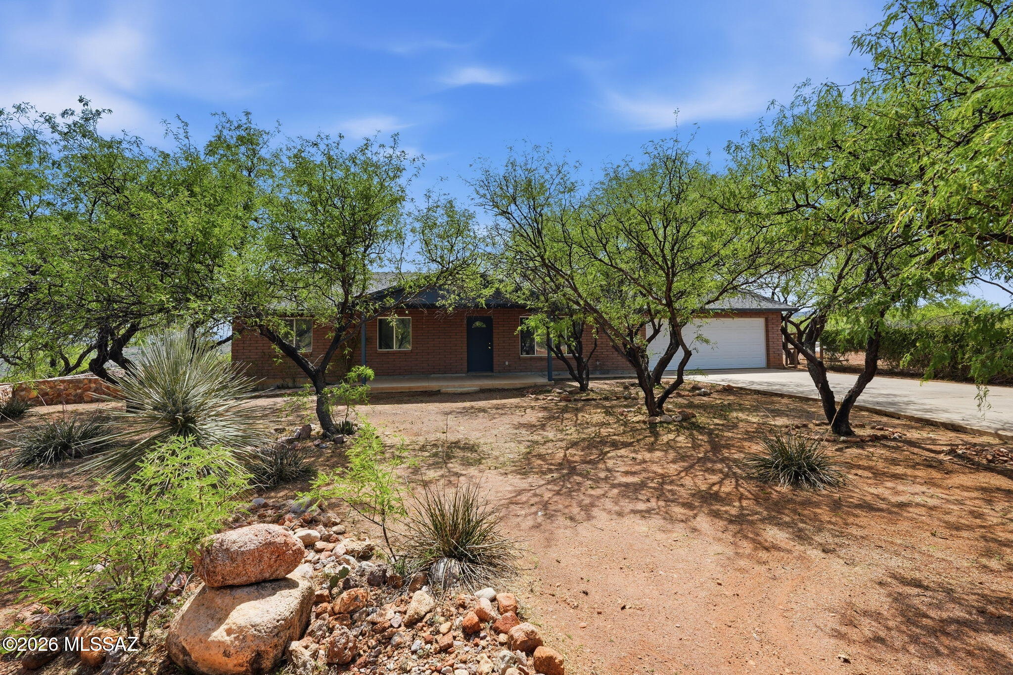 1462 Circulo Sombrero Rio Rico, AZ 85648 - Photo 8 of 50 An inviting desert Oasis on over 1/2 acre. Huge back covered porch to relax and enjoy the views.
