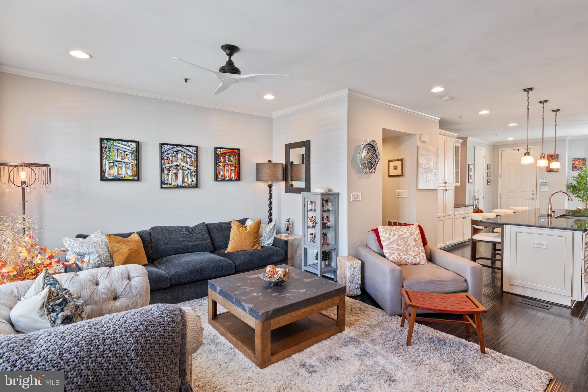 1311 Belt Street Baltimore, MD 21230 - Photo 12 of 65 a living room with furniture kitchen view and a table