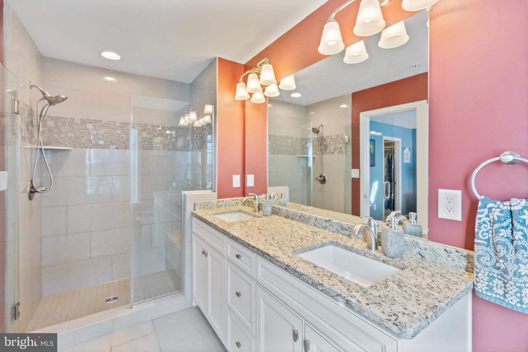 1311 Belt Street Baltimore, MD 21230 - Photo 25 of 65 a bathroom with a granite countertop sink and a mirror