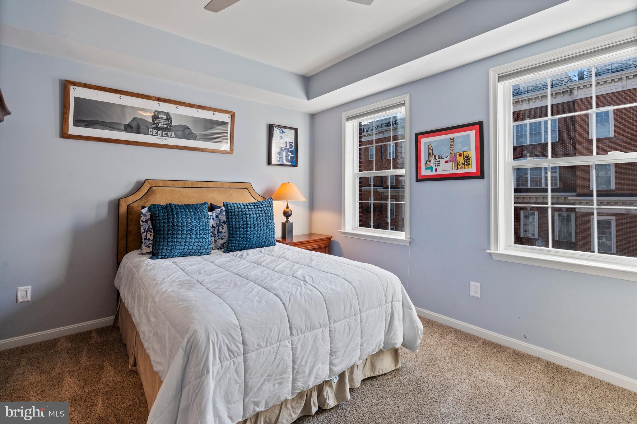 1311 Belt Street Baltimore, MD 21230 - Photo 34 of 65 a bedroom with a bed and wooden floor