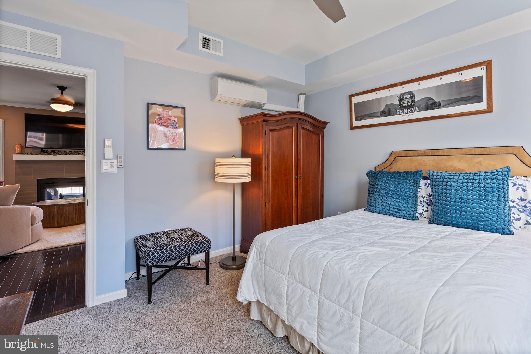 1311 Belt Street Baltimore, MD 21230 - Photo 35 of 65 a bedroom with a bed and a table in it