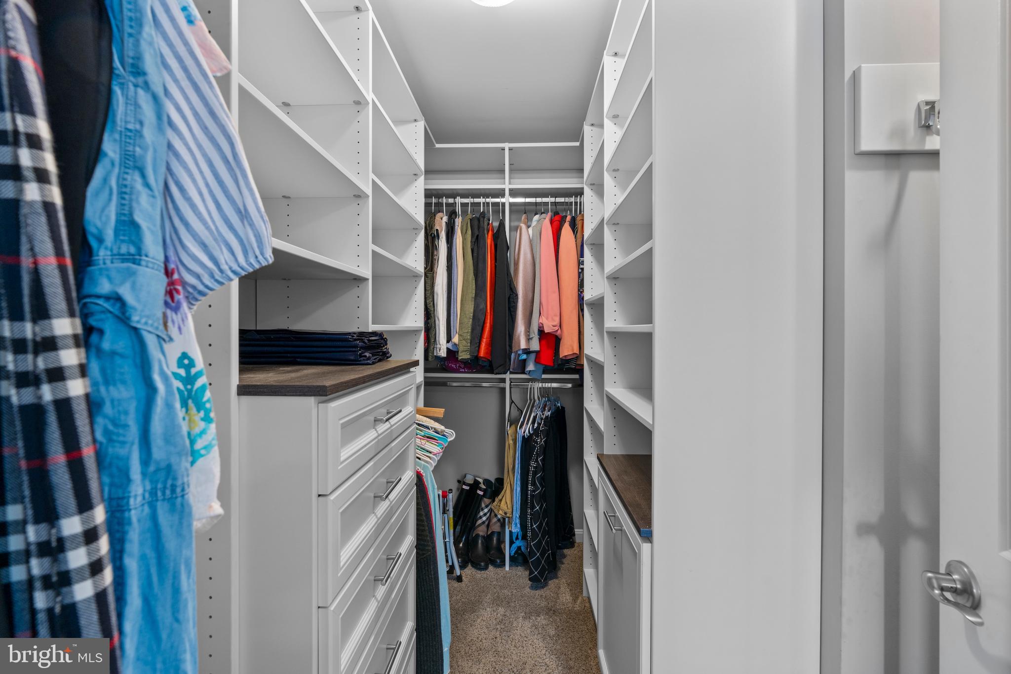 1311 Belt Street Baltimore, MD 21230 - Photo 43 of 65 a view of walk in closet with clothes
