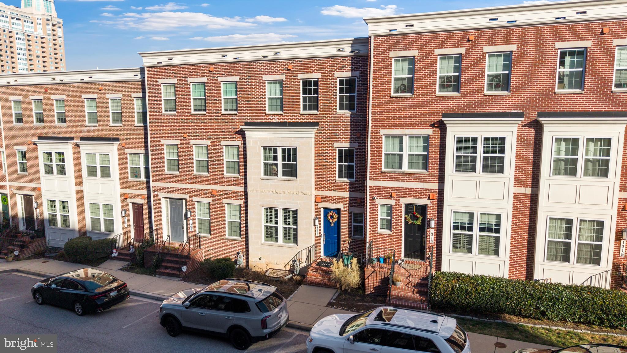 1311 Belt Street Baltimore, MD 21230 - Photo 50 of 65 a cars parked in front of a building