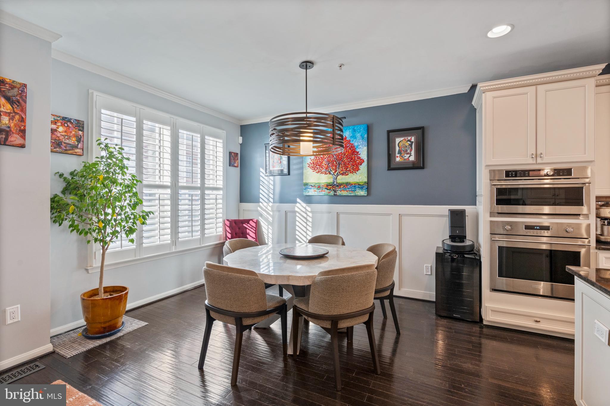 1311 Belt Street Baltimore, MD 21230 - Photo 5 of 65 a view of a dining room with furniture window and wooden floor