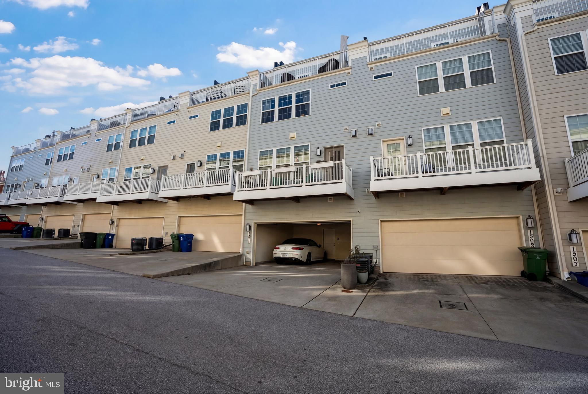 1311 Belt Street Baltimore, MD 21230 - Photo 62 of 65 a car parked in front of a building