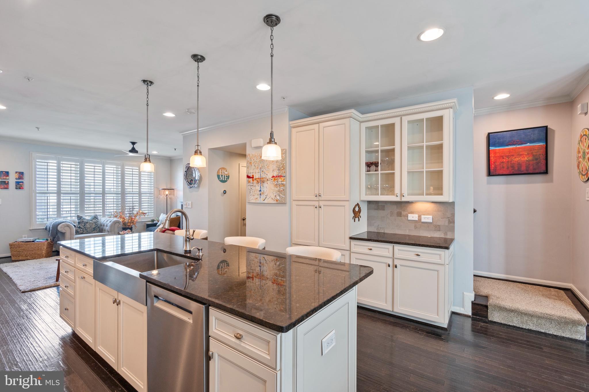 1311 Belt Street Baltimore, MD 21230 - Photo 7 of 65 a kitchen with stainless steel appliances granite countertop a sink stove and refrigerator