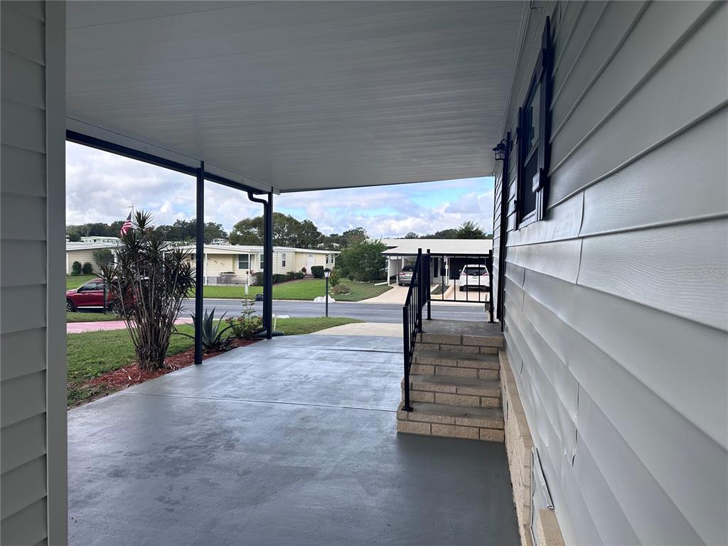 3458 North Citrus Circle, Unit 1803 Zellwood, FL 32798 - Photo 19 of 20 a view of a porch