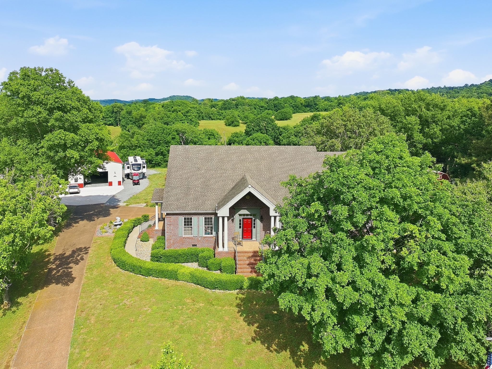1150 Cochran Cemetery Road Lewisburg, TN 37091 - Photo 47 of 63 a aerial view of a house with swimming pool and garden