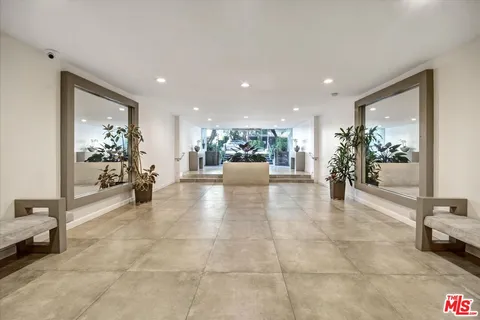a view of a livingroom with furniture and a livingroom