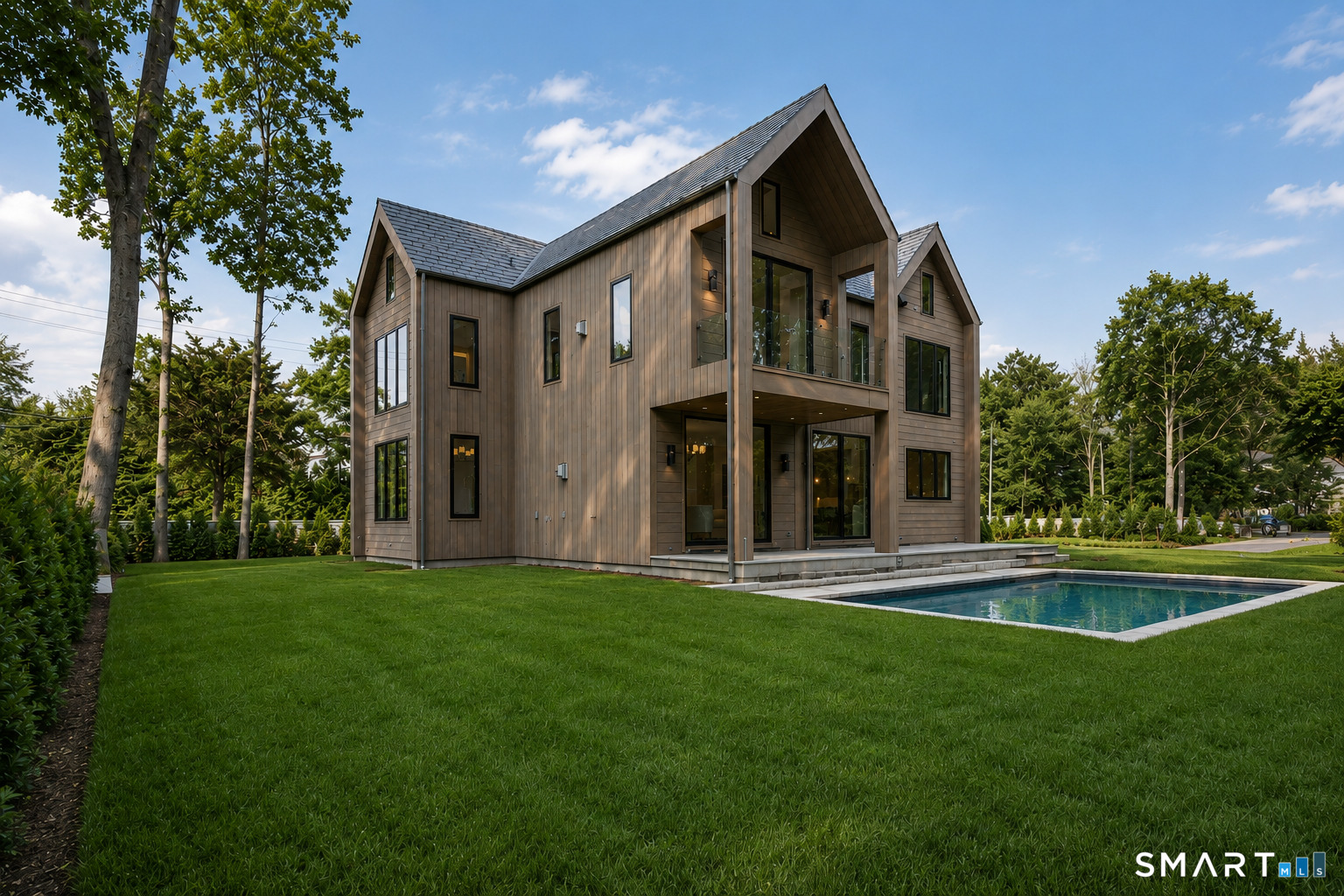 2 Windy Hill Road Westport, CT 06880 - Photo 39 of 40 a view of a house with a yard