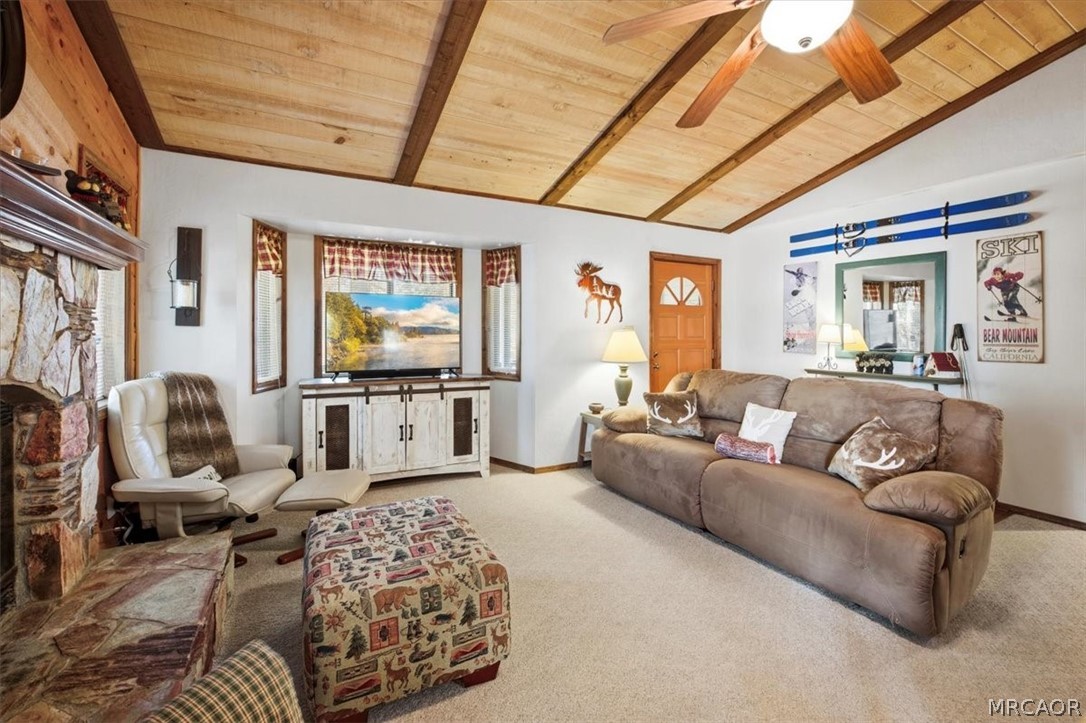 358 Victoria Lane Sugarloaf, CA 92386 - Photo 13 of 38 a living room with furniture and a flat screen tv