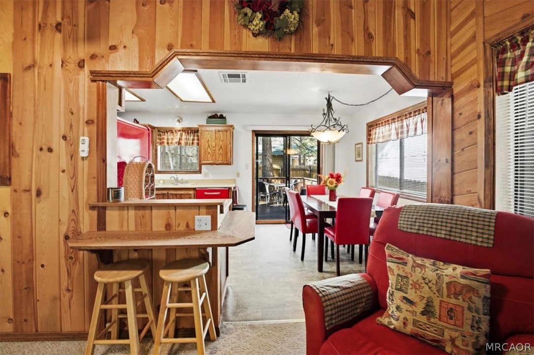 358 Victoria Lane Sugarloaf, CA 92386 - Photo 14 of 38 a view of a dining room with furniture window and outside view