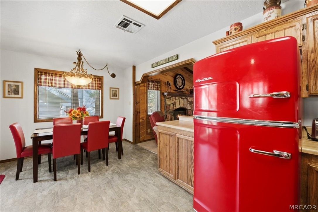 358 Victoria Lane Sugarloaf, CA 92386 - Photo 18 of 38 a dining room with furniture and window