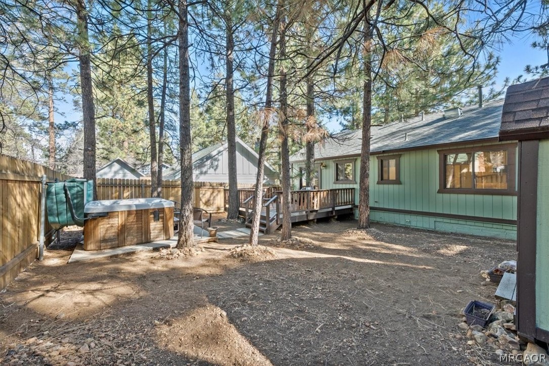 358 Victoria Lane Sugarloaf, CA 92386 - Photo 35 of 38 a view of a house with a yard covered in snow