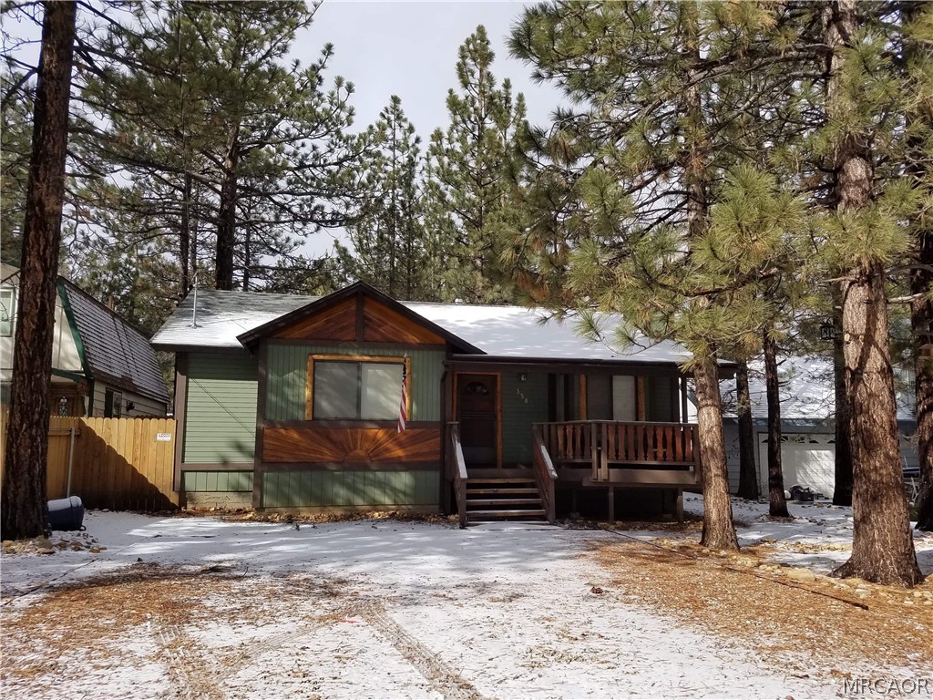 358 Victoria Lane Sugarloaf, CA 92386 - Photo 38 of 38 a view of a house with a tree in the background