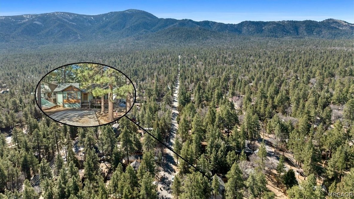 358 Victoria Lane Sugarloaf, CA 92386 - Photo 7 of 38 a aerial view of a house with mountain view