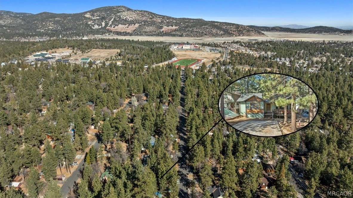358 Victoria Lane Sugarloaf, CA 92386 - Photo 8 of 38 a view of a lake with a mountain in the background