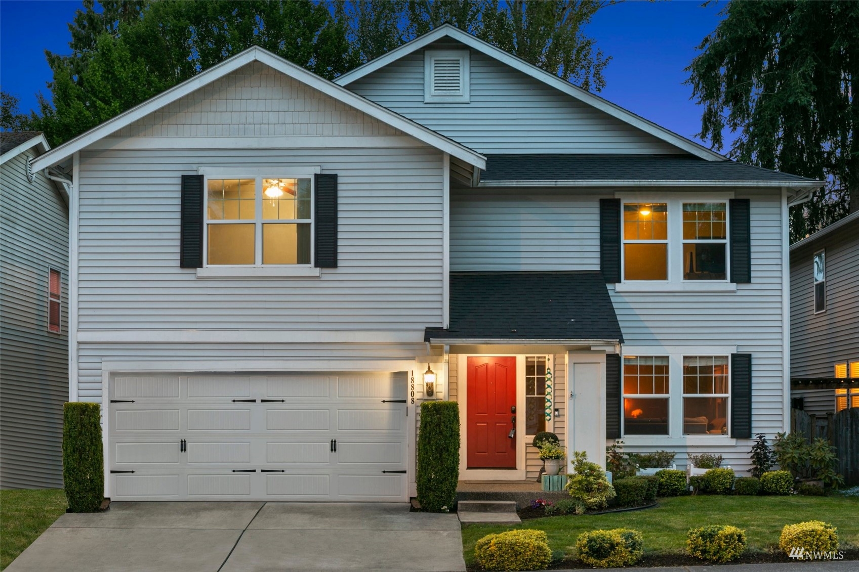 18808 1st Place West Bothell, WA 98012 - Photo 1 of 40 a front view of a house with a yard