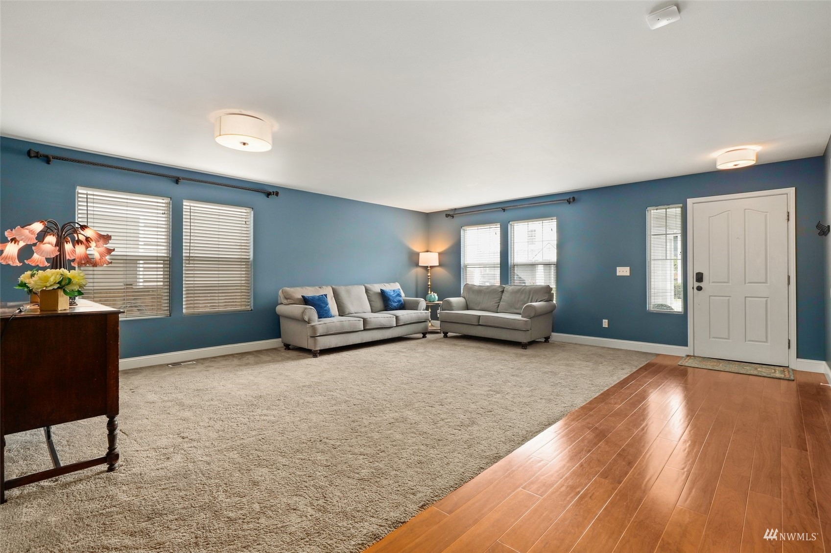 18808 1st Place West Bothell, WA 98012 - Photo 16 of 40 a living room with furniture and flowers