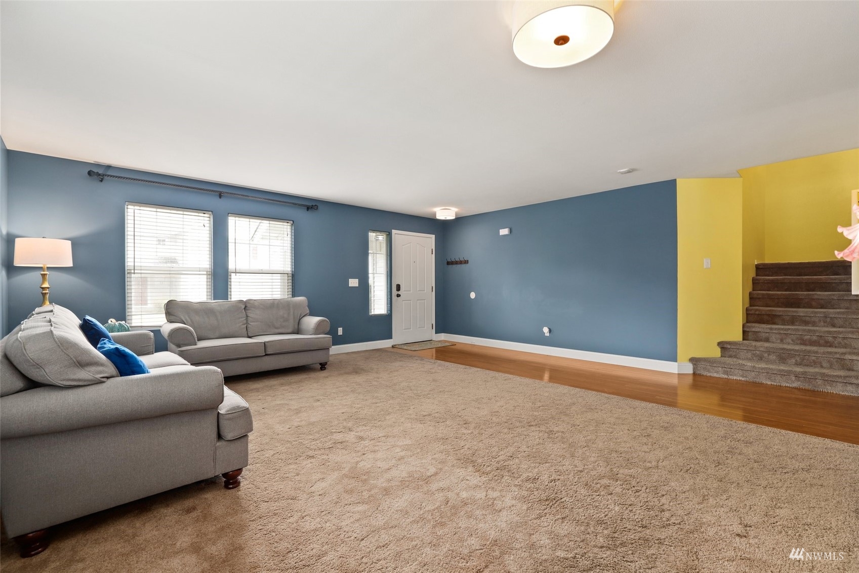 18808 1st Place West Bothell, WA 98012 - Photo 17 of 40 a living room with furniture and a large window