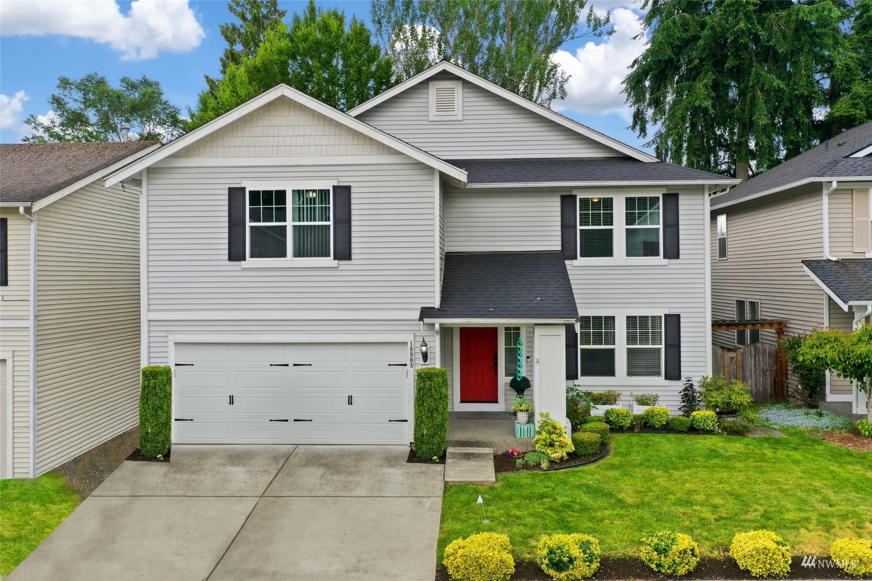 18808 1st Place West Bothell, WA 98012 - Photo 2 of 40 a view of a house with garden
