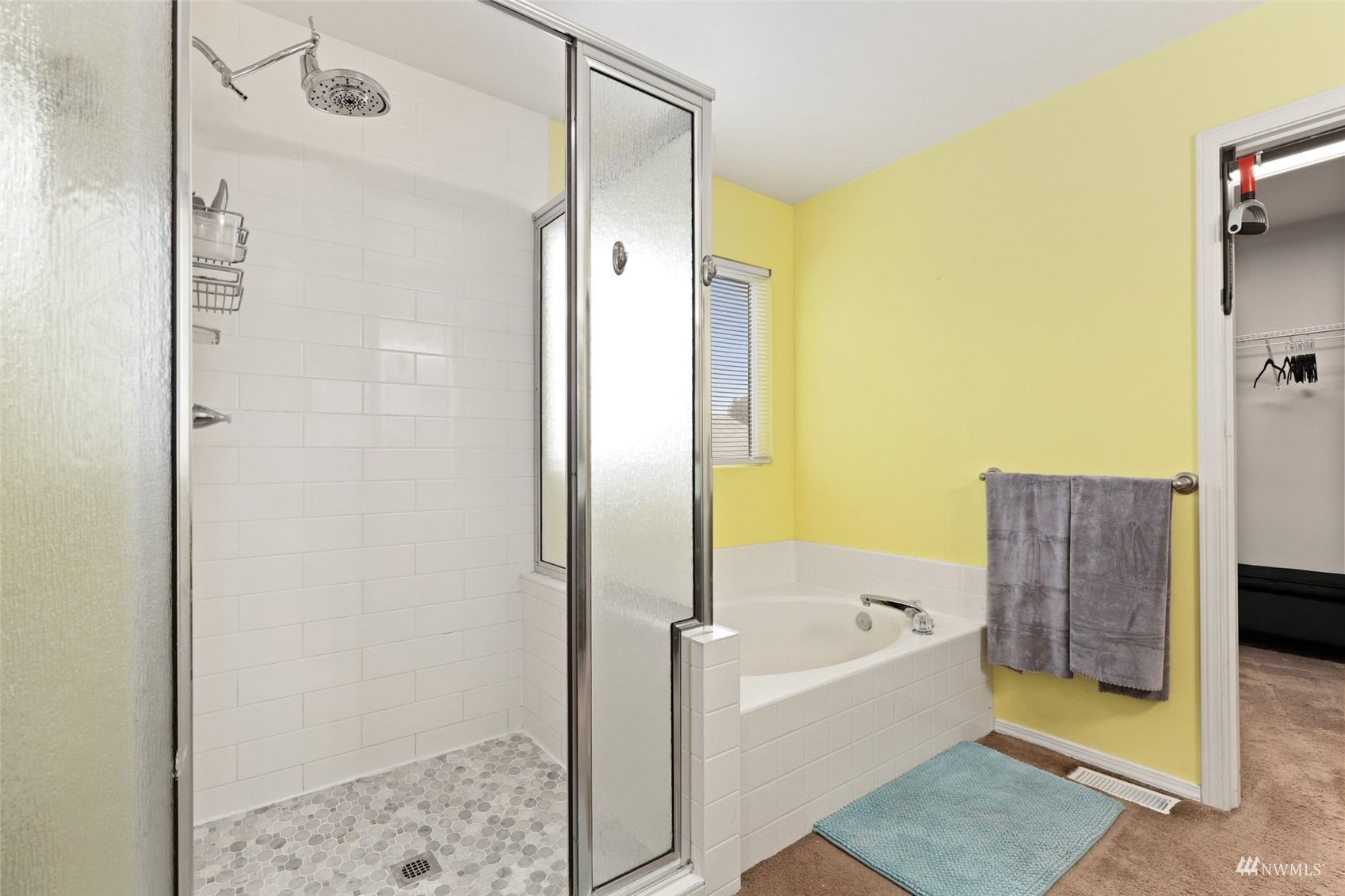 18808 1st Place West Bothell, WA 98012 - Photo 23 of 40 a bathroom with a bathtub and a shower