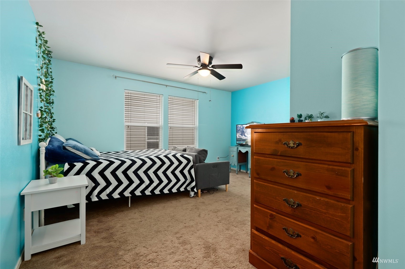 18808 1st Place West Bothell, WA 98012 - Photo 25 of 40 a bedroom with a bed and a ceiling fan
