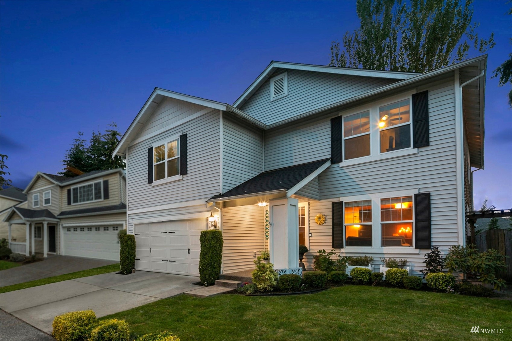 18808 1st Place West Bothell, WA 98012 - Photo 3 of 40 a front view of a house with a yard