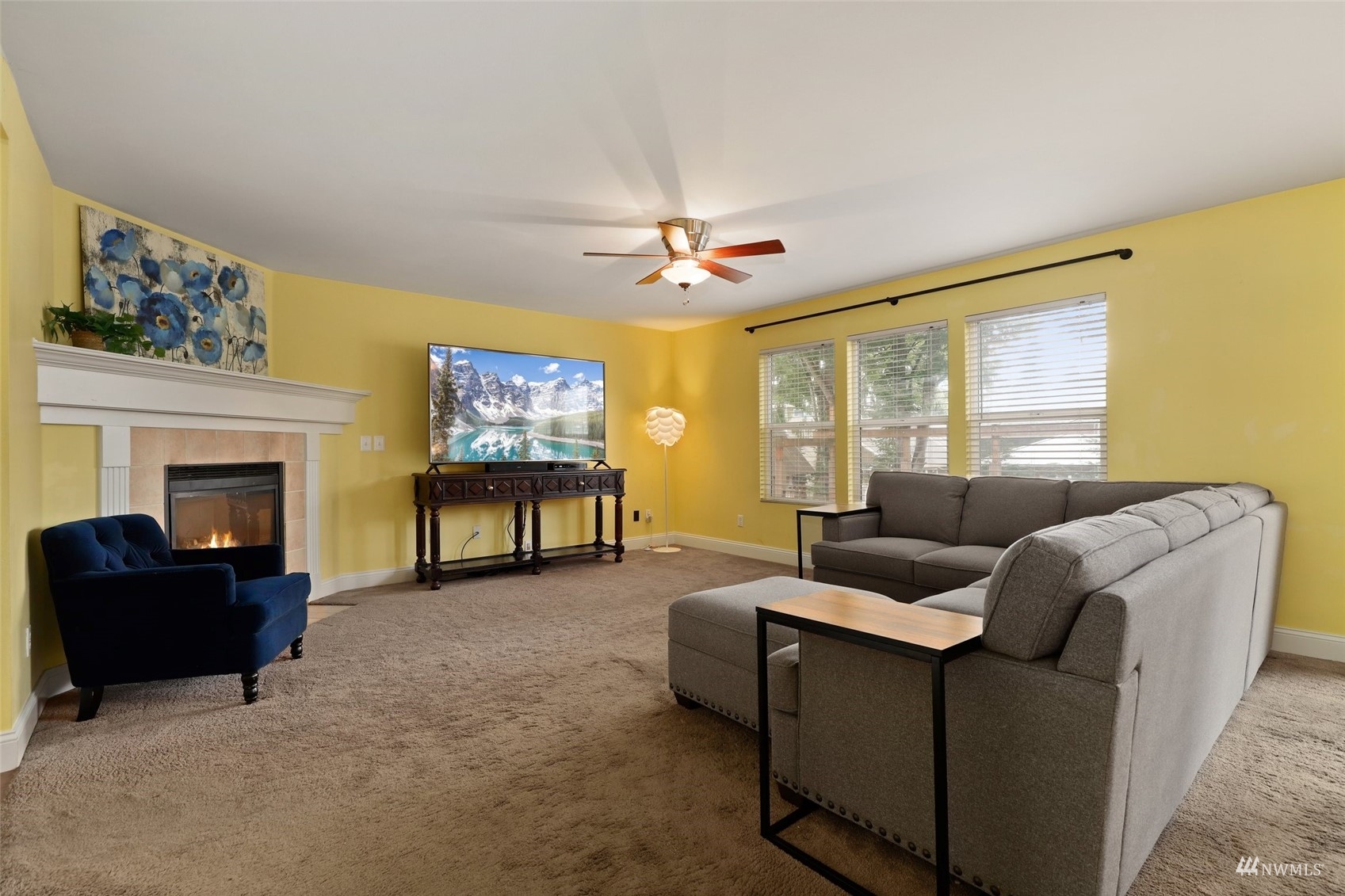 18808 1st Place West Bothell, WA 98012 - Photo 5 of 40 a living room with furniture and a fireplace
