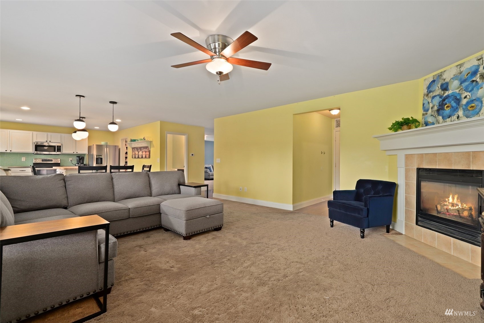 18808 1st Place West Bothell, WA 98012 - Photo 6 of 40 a living room with furniture and a fireplace
