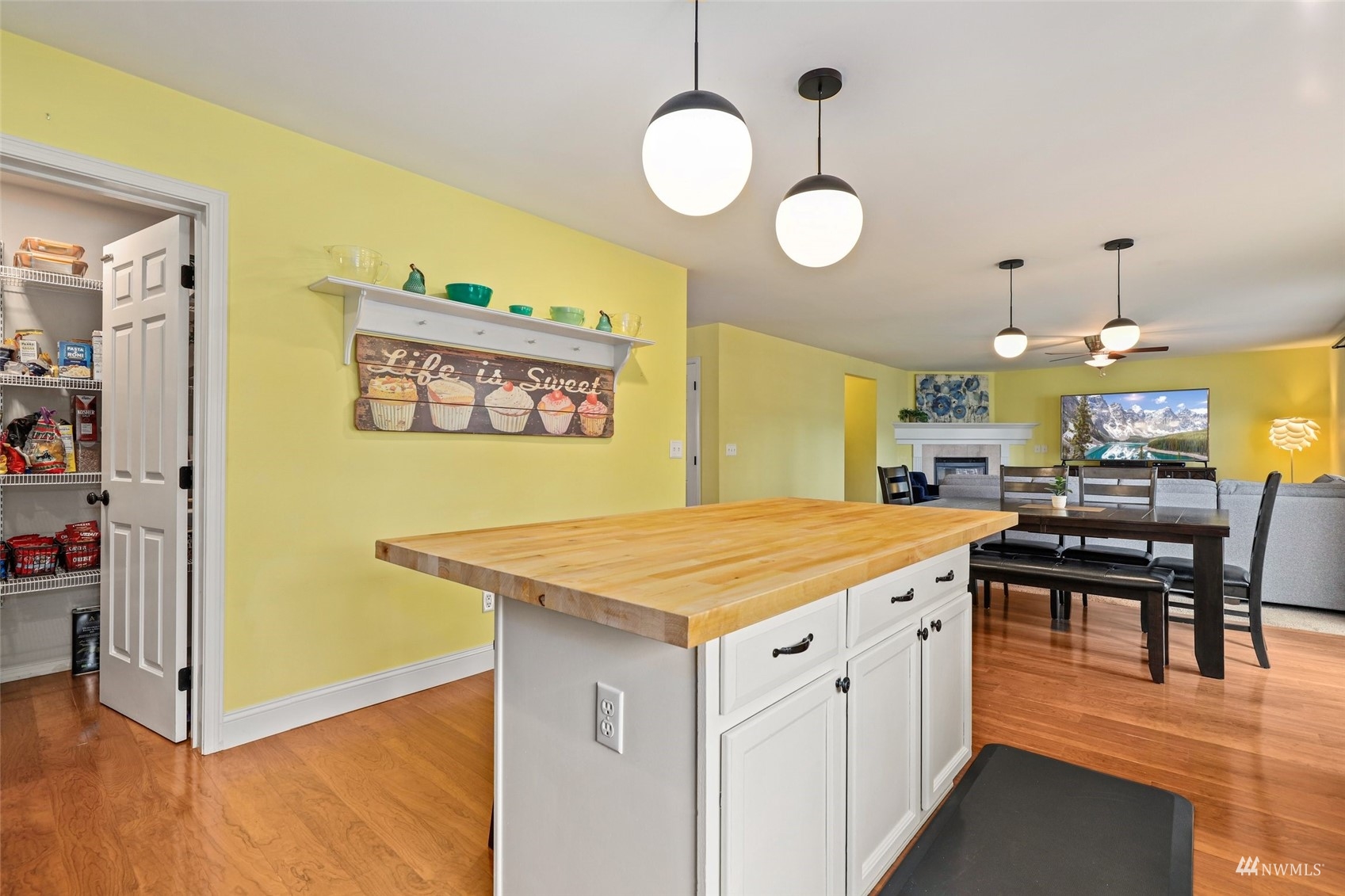 18808 1st Place West Bothell, WA 98012 - Photo 10 of 40 a kitchen with a table and chairs in it