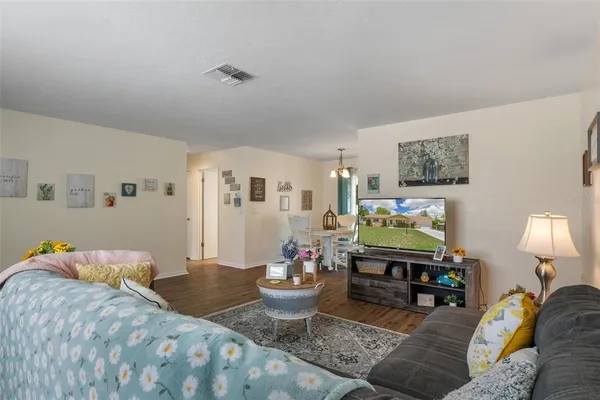 a living room with furniture and a table