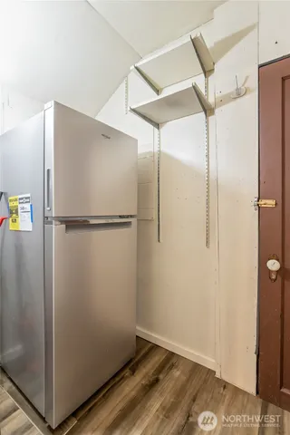a kitchen with sink stove and cabinets