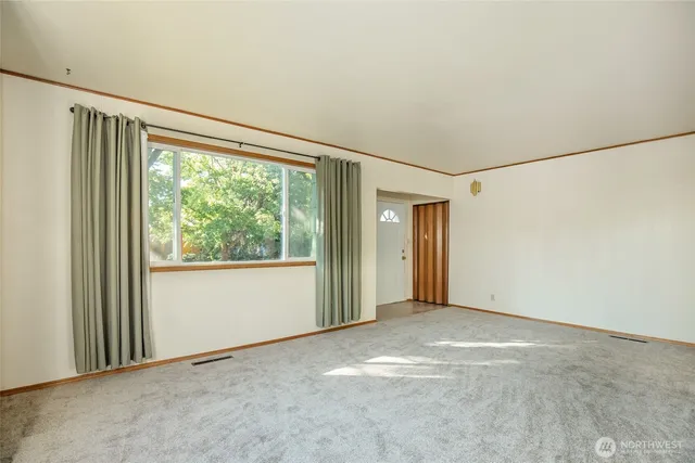 an empty room with windows