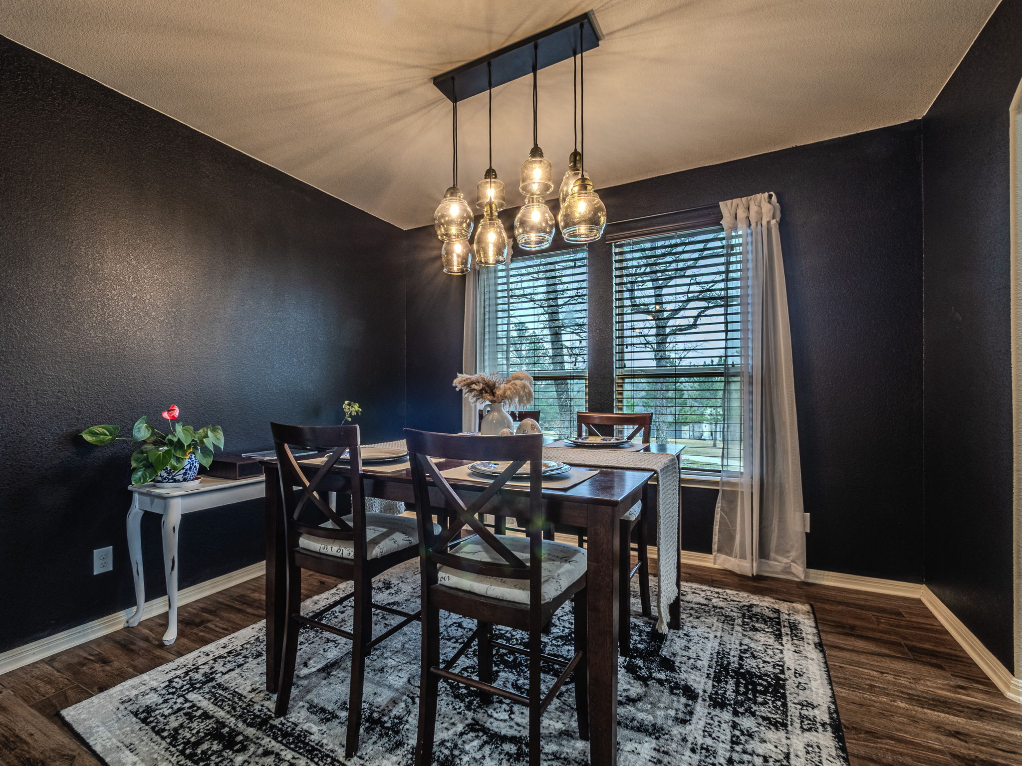 117 Arbor Point Drive Elgin, TX 78621 - Photo 11 of 40 a view of a dining room with furniture and chandelier
