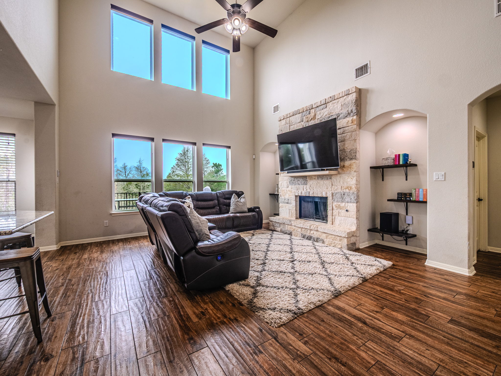 117 Arbor Point Drive Elgin, TX 78621 - Photo 6 of 40 a living room with furniture fireplace and flat screen tv