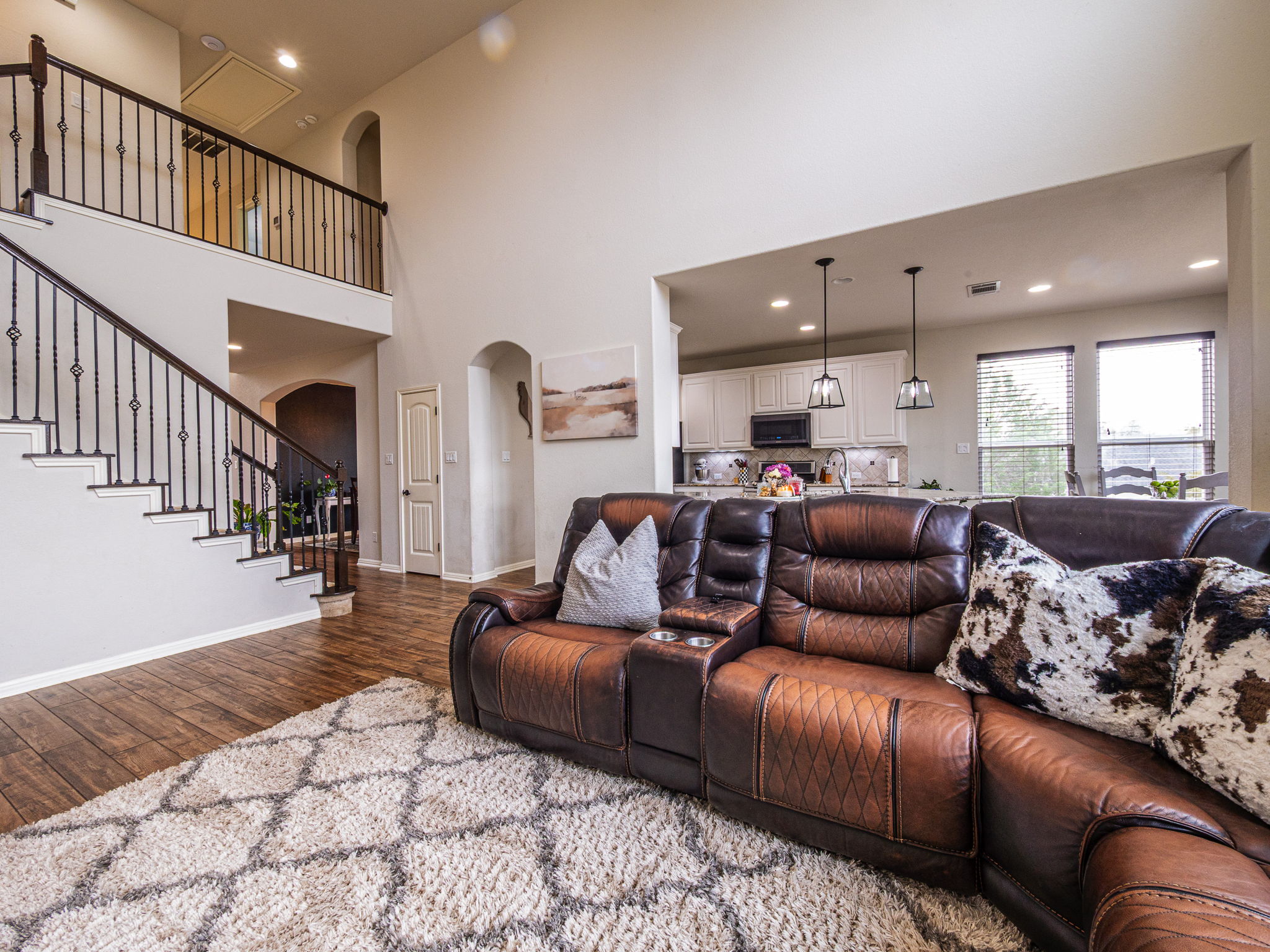 117 Arbor Point Drive Elgin, TX 78621 - Photo 7 of 40 a living room with furniture or couch and a wooden floor