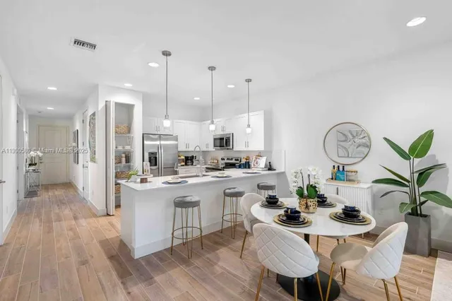 a bed room with a bed and a chair